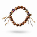 Bronze Hematite & Austrian Crystal Bracelet with a pavé cross charm and gold and silver chain tassels
