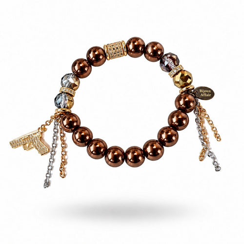 Bronze Hematite & Austrian Crystal Bracelet with a pavé pistol charm and gold and silver chain tassels