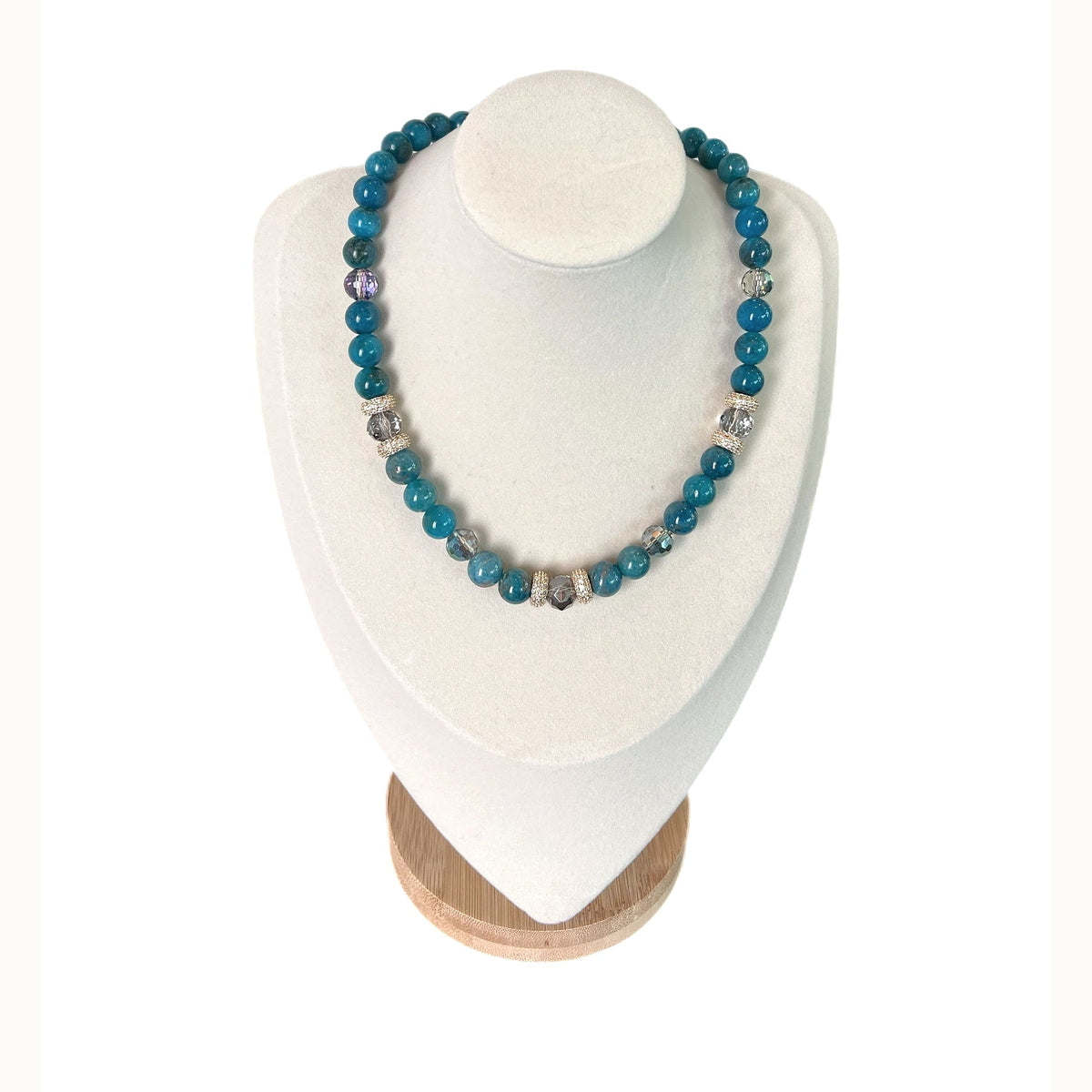 The Melania Necklace on a display bust: teal blue apatite with faceted Austrian crystals and gold pavé rondelles