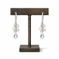 Pearl & Clear Crystal Drop Earrings — glass pearls and clear crystals on a pavé silver hoop, on a bronze earring stand